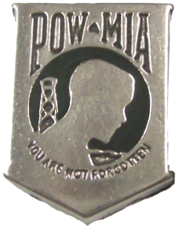 Vest extender with medallion